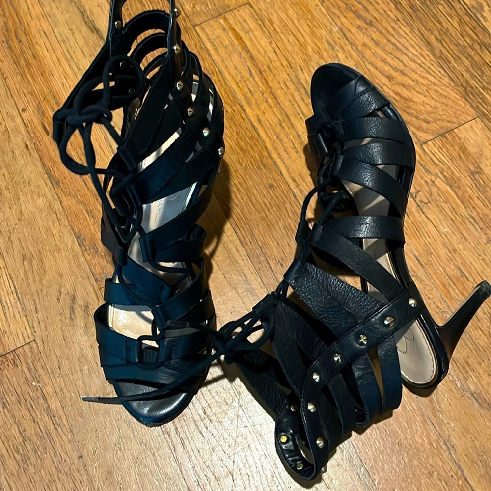 Gladiator sandals with gold studded detail.